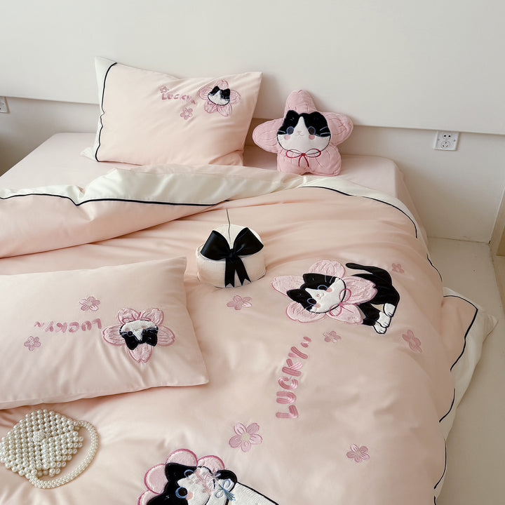 Bedding set with embroidered cat appliqués and soft cotton satin