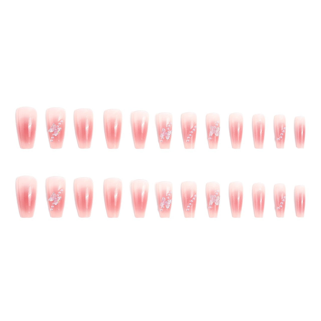 Artificial nails with luxurious pearl and glitter decorations Stornfield
