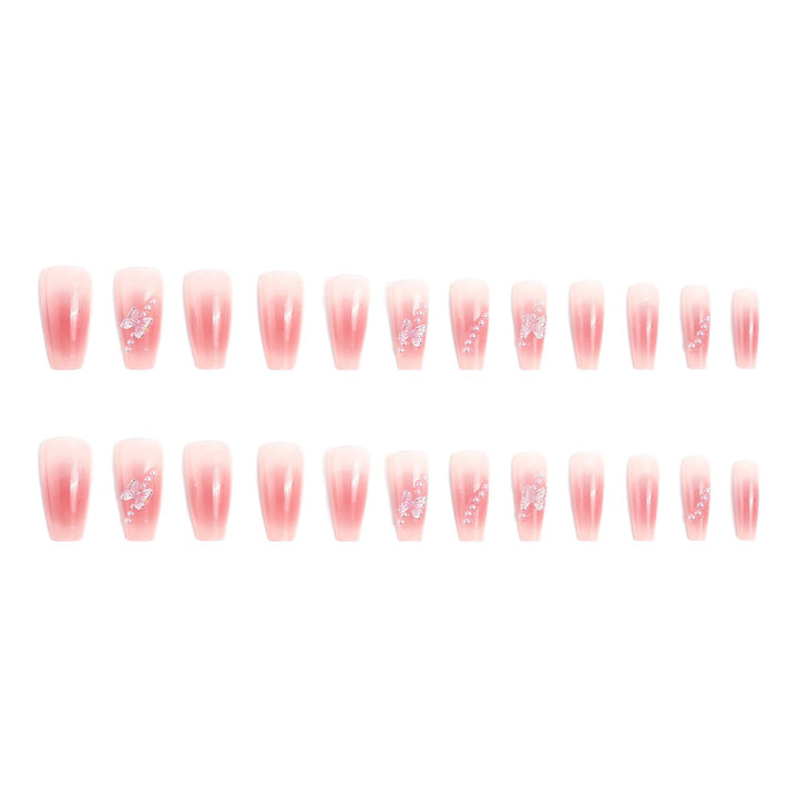 Artificial nails with luxurious pearl and glitter decorations Stornfield