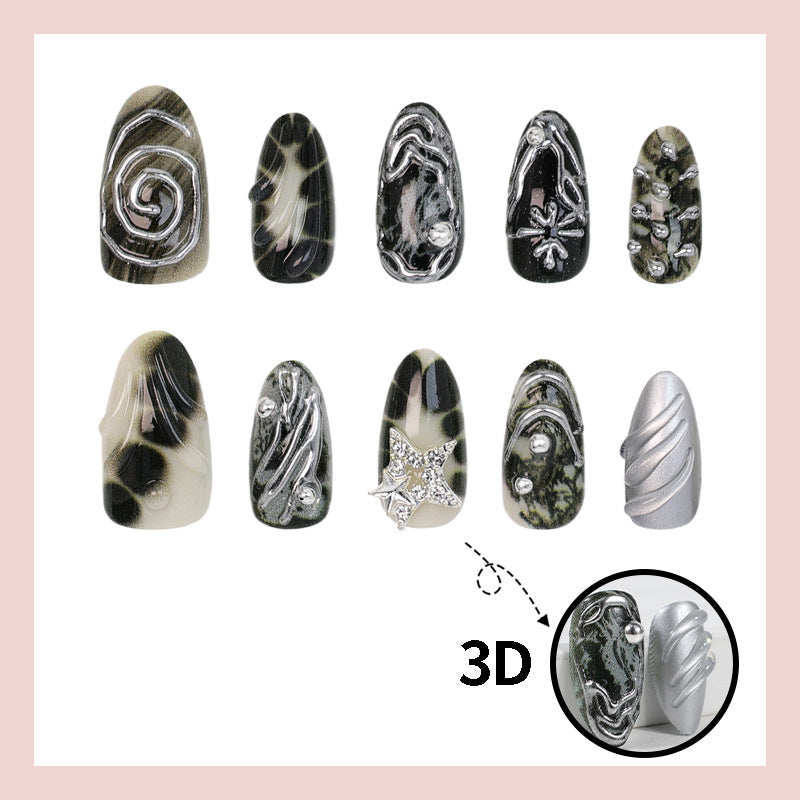Art nail set with artistic patterns and glitter accents Stornfield
