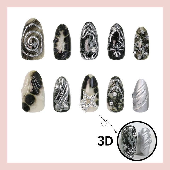 Art nail set with artistic patterns and glitter accents Stornfield