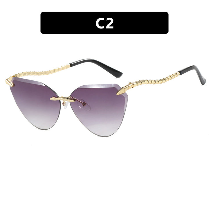 Women's Cat-Eye Sunglasses with unique gold frame design and protective lenses Stornfield