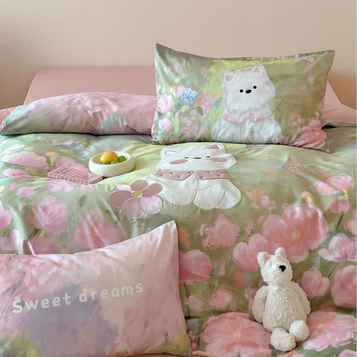Children's bedding set with applied cat detail, watercolor flower print, and extra soft cotton blend