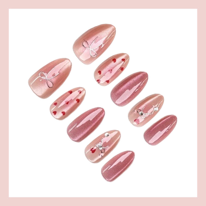 Nail art set with romantic hearts and elegant bows Stornfield