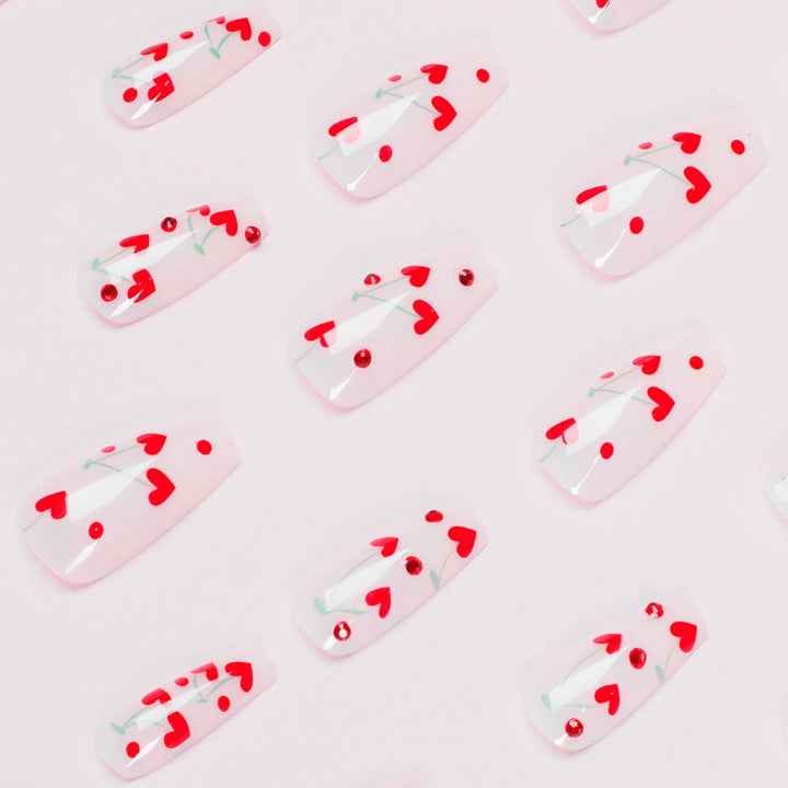Artificial nail art with romantic heart design Stornfield