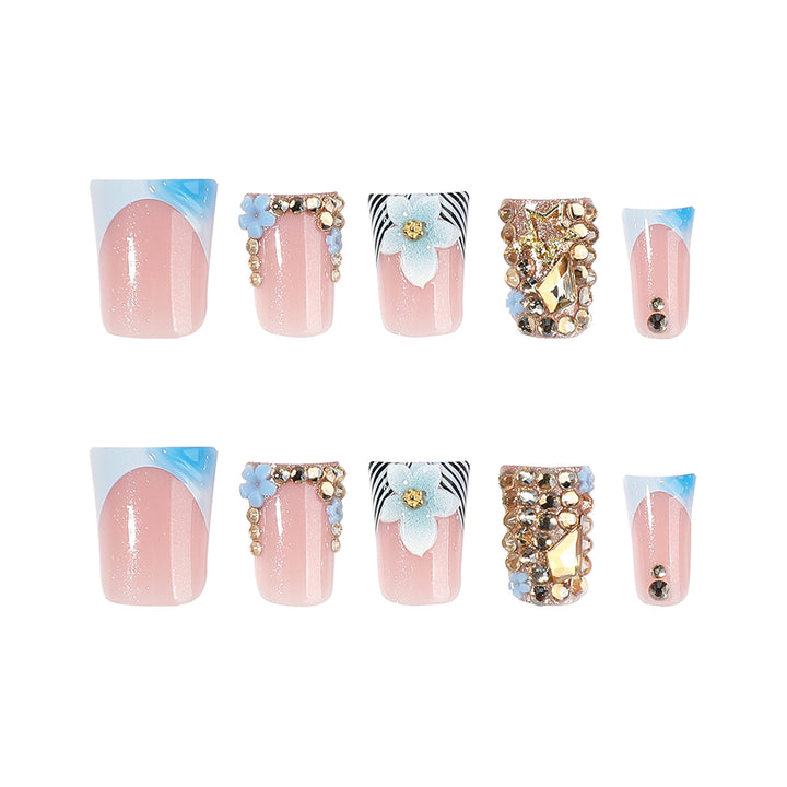 Artful Nail Extensions with Floral Design and Glitter Stornfield