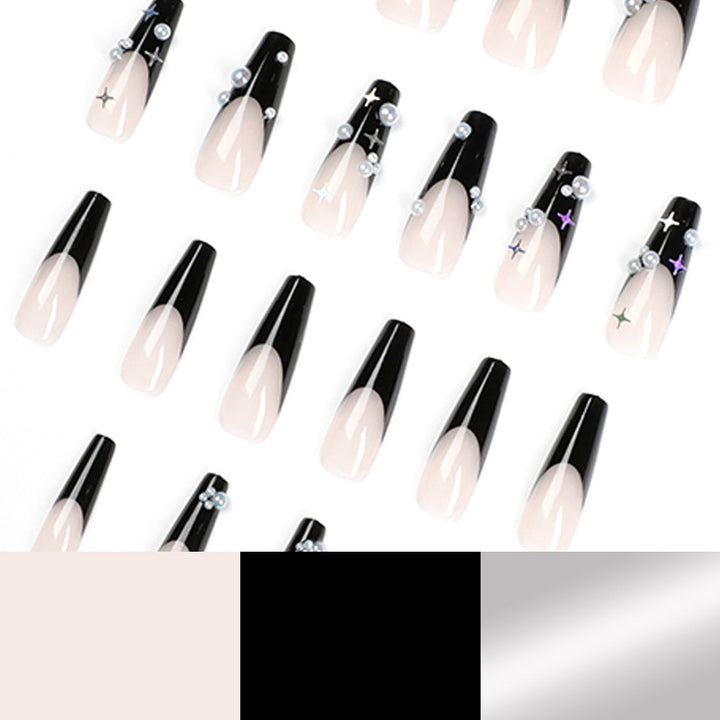 Artificial nail art with pearl and shine elements Stornfield