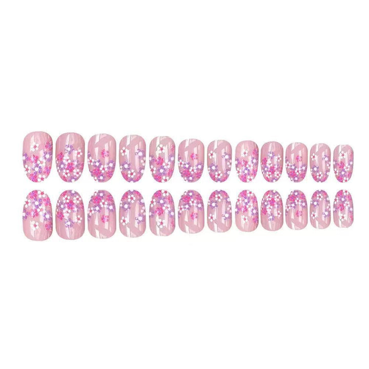 Nail set with floral design and sparkling accents Stornfield