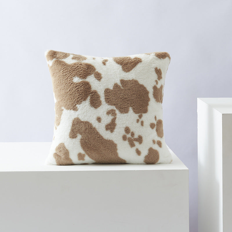 Decorative pillow with cow pattern
