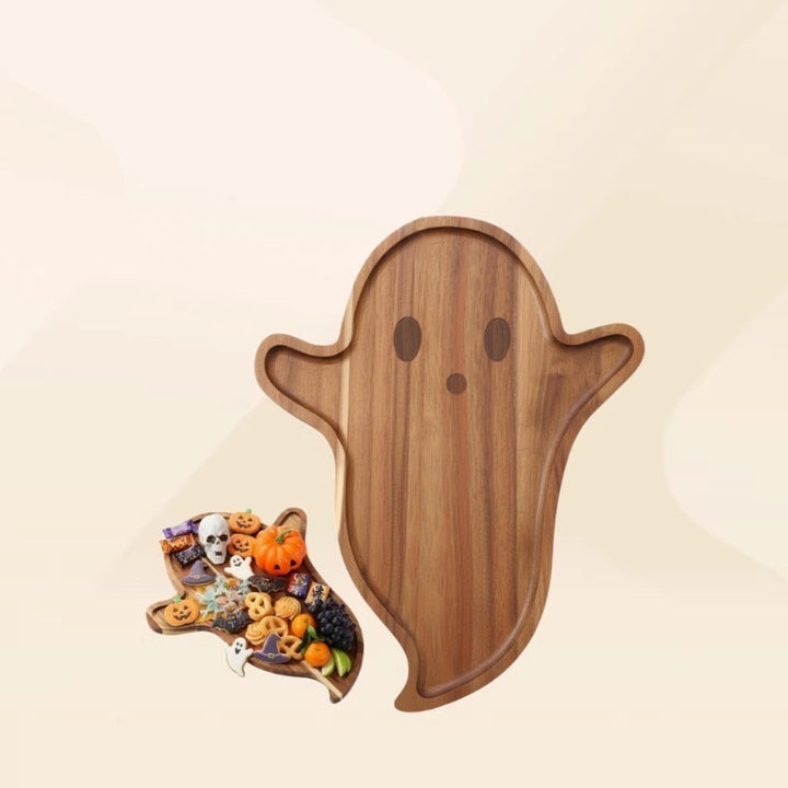 Skull-shaped cutting and serving board made of acacia wood with skull engraving