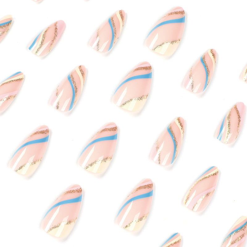 Artistic nail art with metallic accents and abstract designs Stornfield