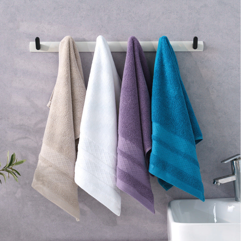 Large premium terry bath towel with decorative structure border