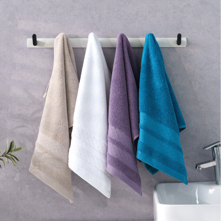 Large premium terry bath towel with decorative structure border