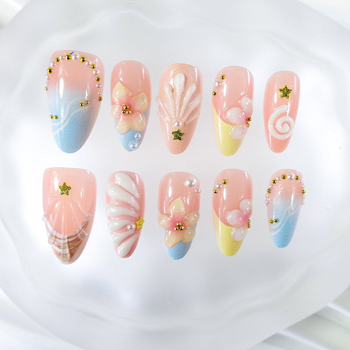 Artificial nail set with elegant flower and shell design Stornfield