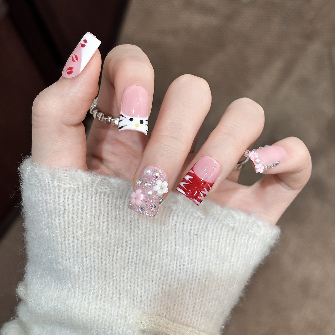 Artistic Press-On Nail Set with Floral and Charms