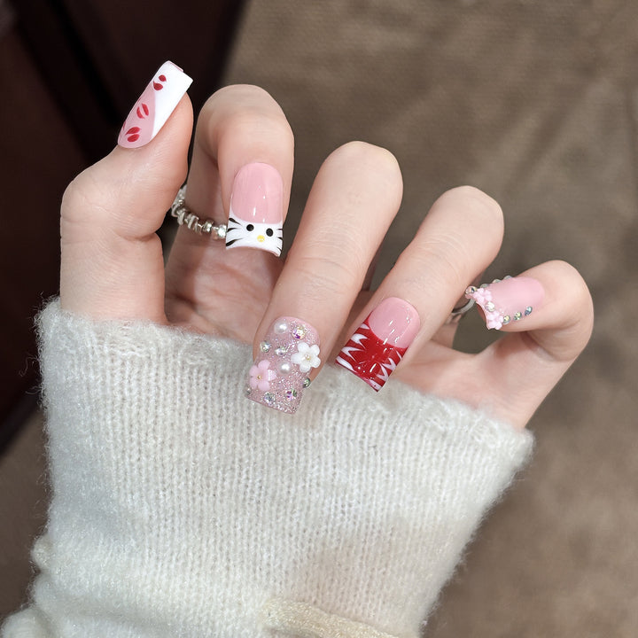 Artistic Press-On Nail Set with Floral and Charms