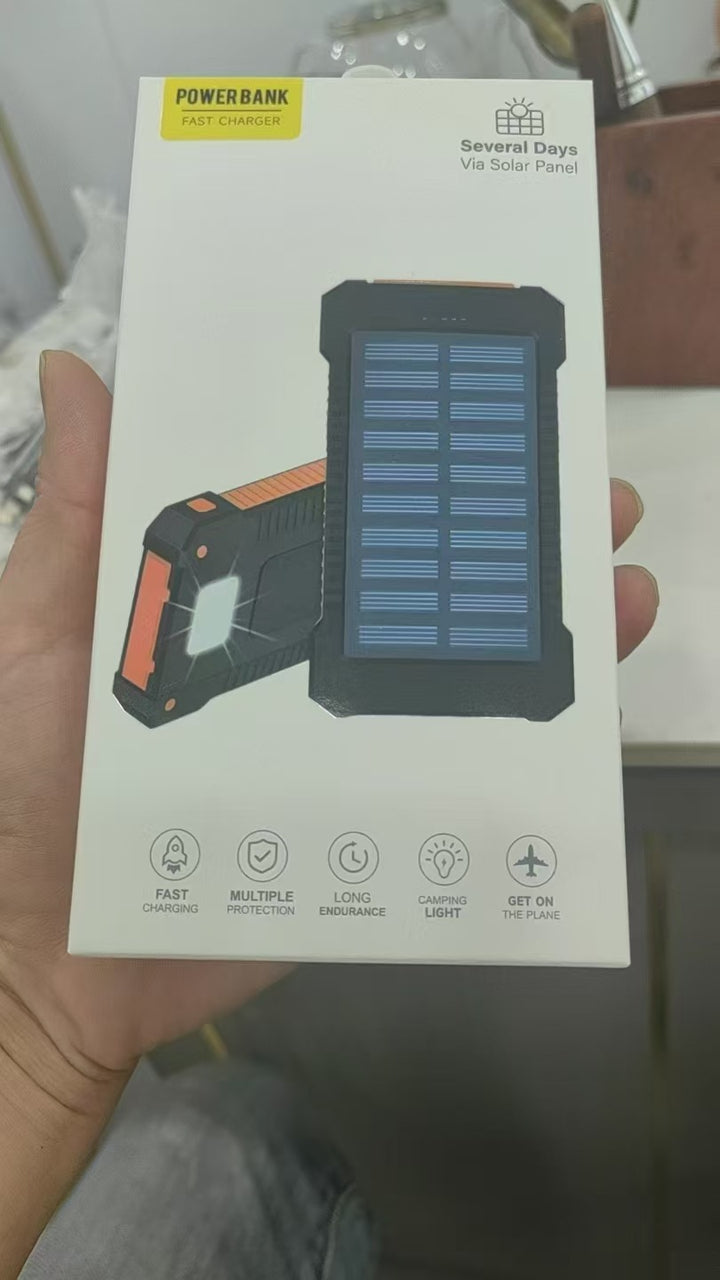 Solar-powered power bank with integrated compass and carabiner hook Stornfield
