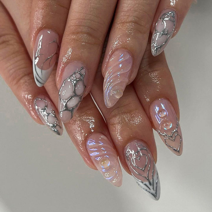 Elegant Stiletto Nail Extensions with Decorative Silver Accents Stornfield