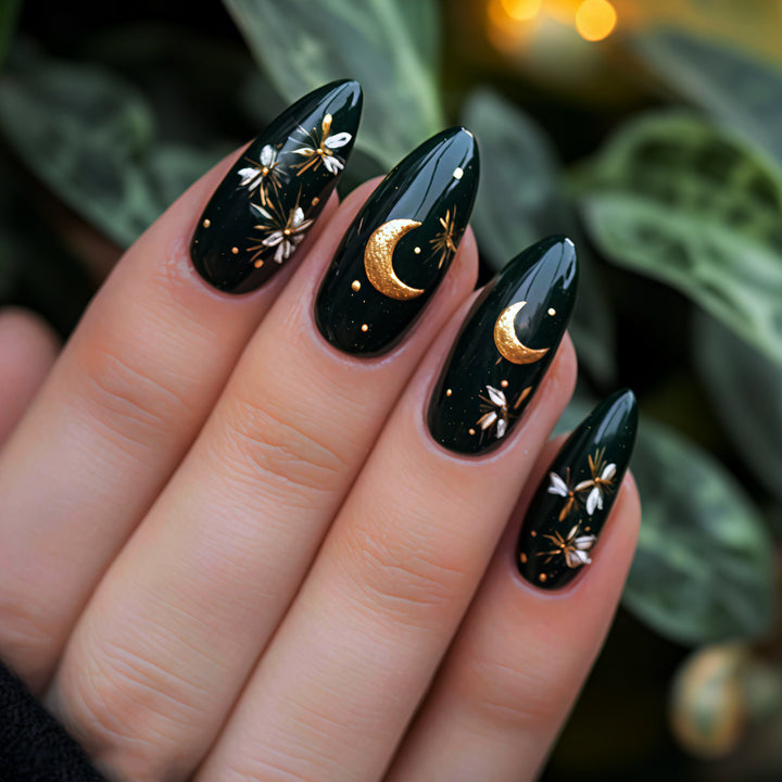 Glamorous artificial nails with moon and flower motifs Stornfield