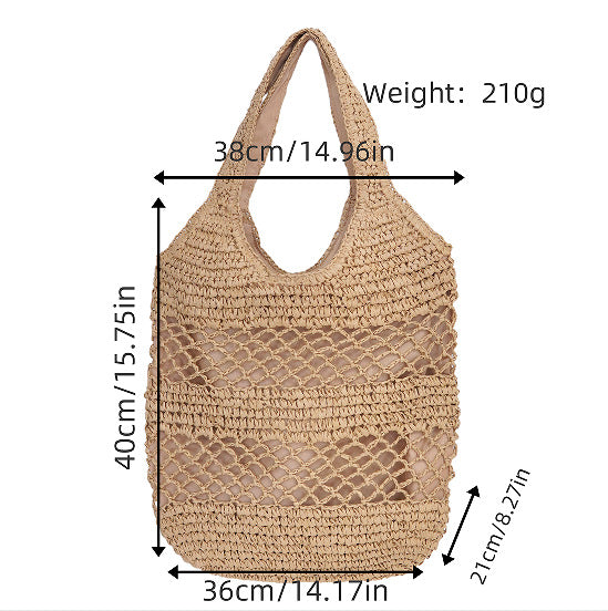 Handbag made of braided natural material with tassel details Stornfield