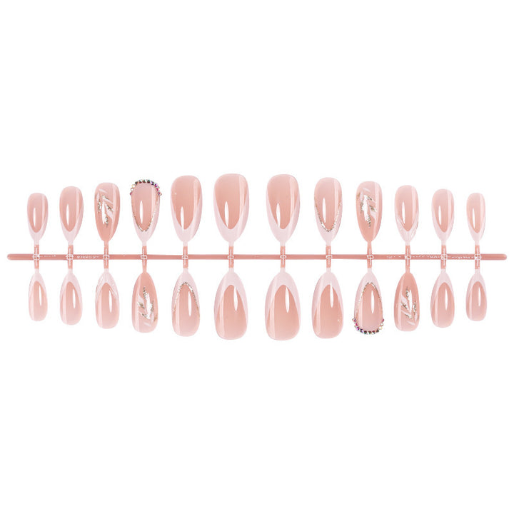 Artificial nail set with elegant tips and glitter accents Stornfield