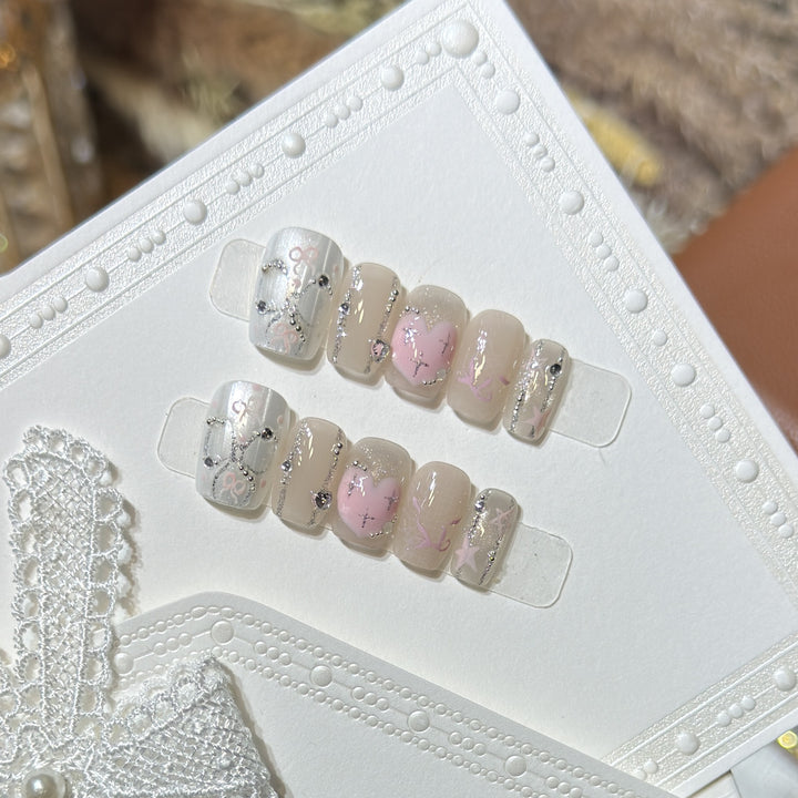 Decorative Press-On Nail Set with Heart and Silver Accents Stornfield