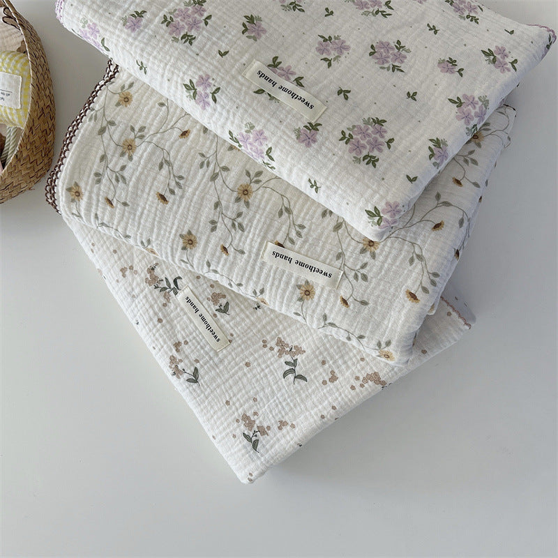 Unisex versatile muslin blanket with floral accents Stornfield
