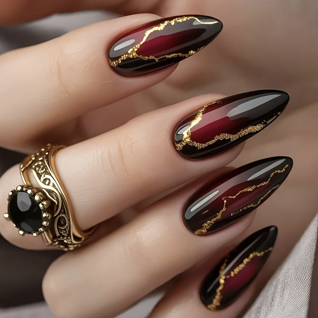 Glossy Stiletto Nail Art Extensions with Gold Accents Stornfield
