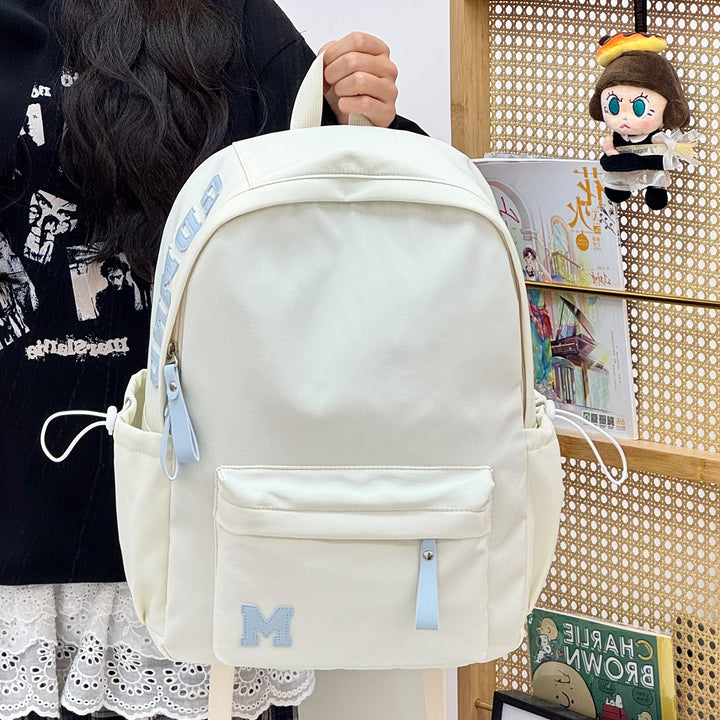 Stylish Canvas Backpack with Plush Keychain Stornfield