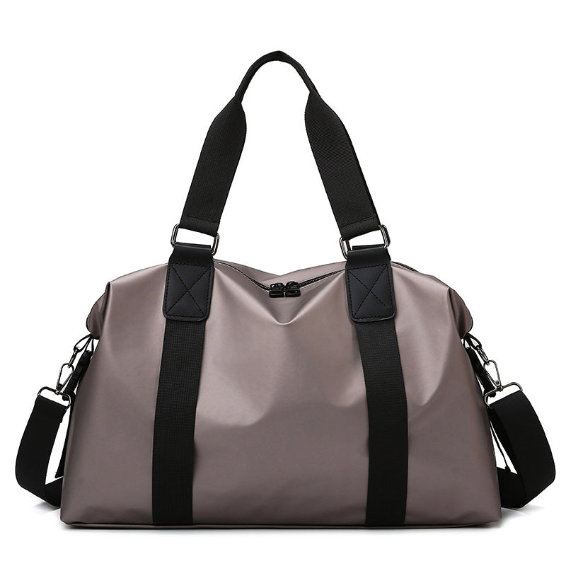 Athletic travel bag made of weather-resistant material with adjustable carrying handles Stornfield