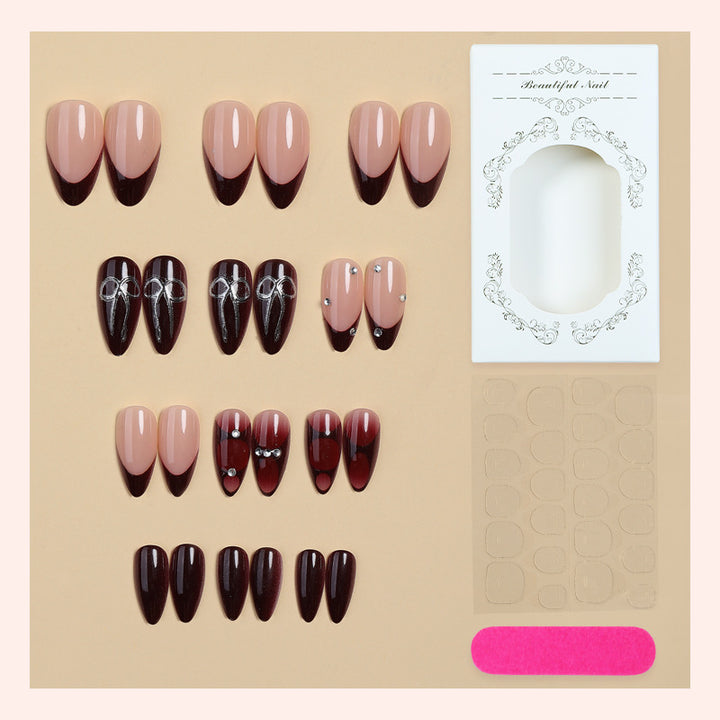 Creative nail art set with elaborate two-tone effect and elegant embellishments Stornfield