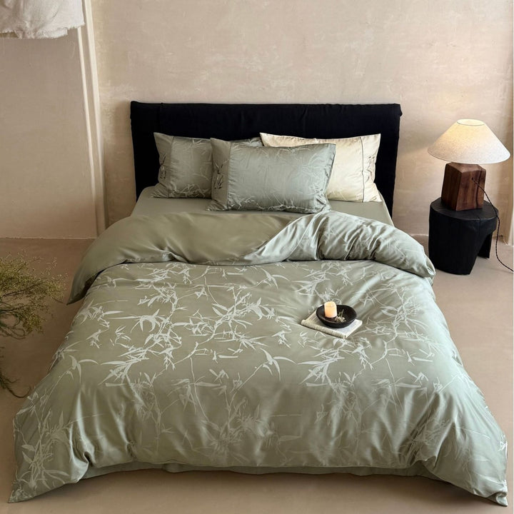 Premium Satin bedding set with subtle jacquard leaf pattern and silky finish