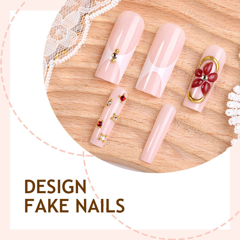 Artificial nail set with floral decorations and elegant accents Stornfield