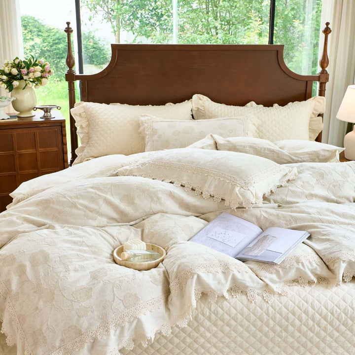 Vintage-inspired cotton-linen bedding set with lace trim and quilting pattern