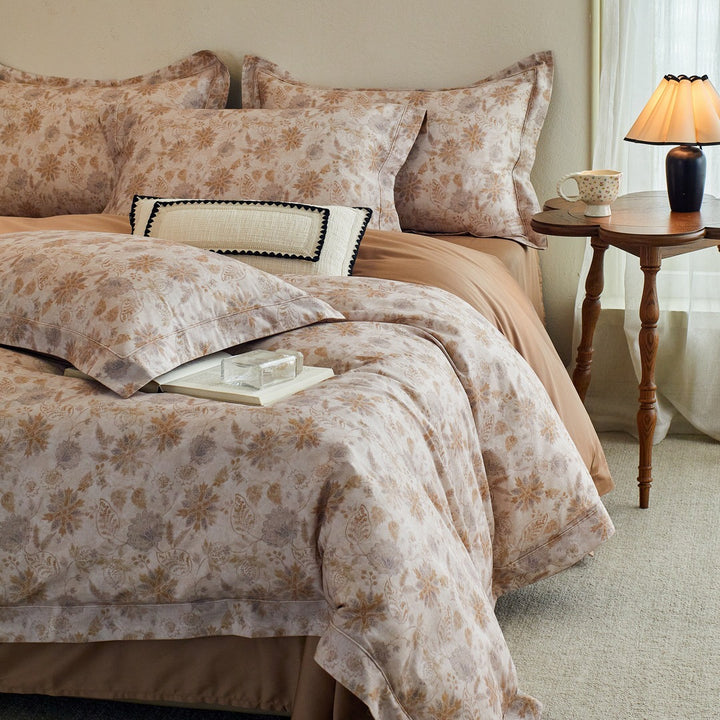 Luxurious cotton satin bed linen set with millefleurs floral pattern and fine piping