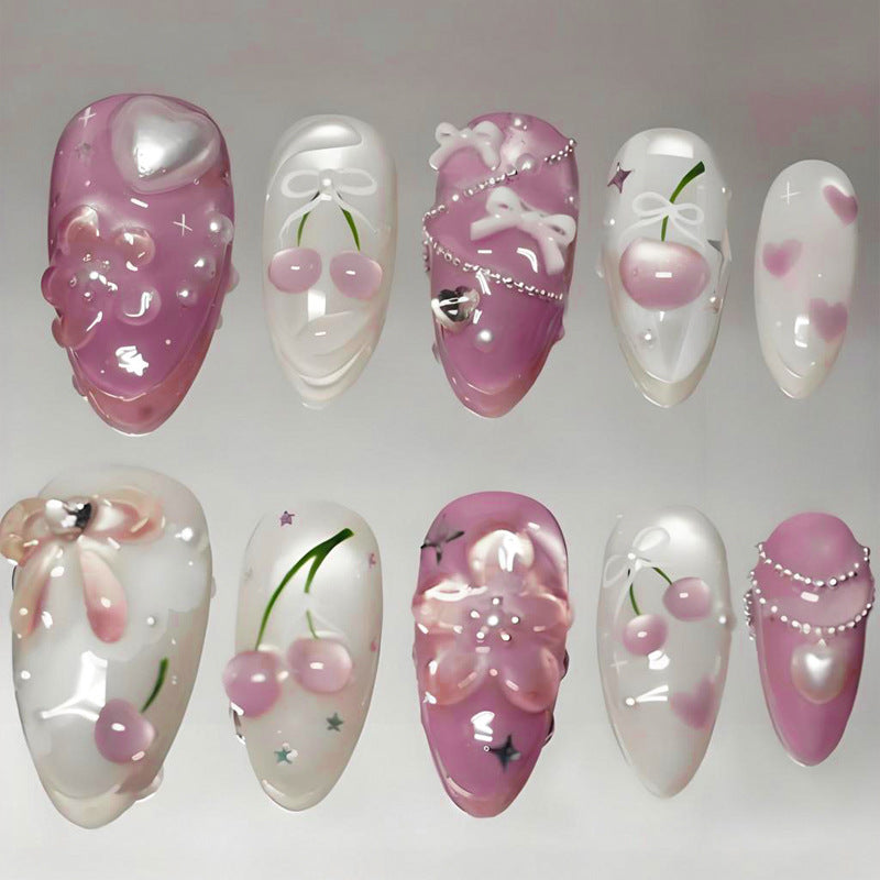 Artificial nail set with creative heart and flower designs Stornfield