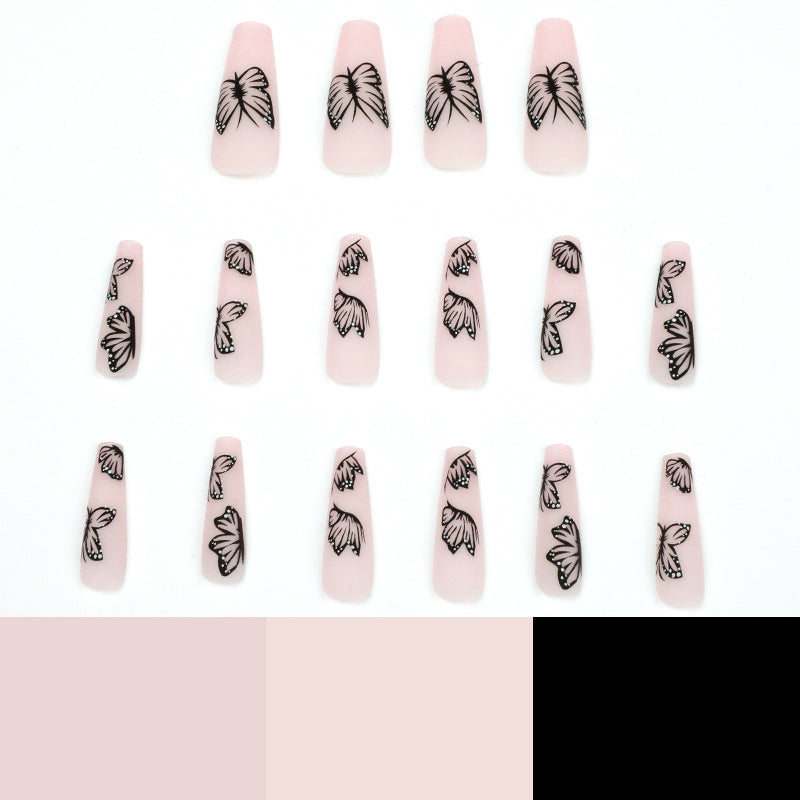 Artistic Nail Extensions with Butterfly Design Stornfield