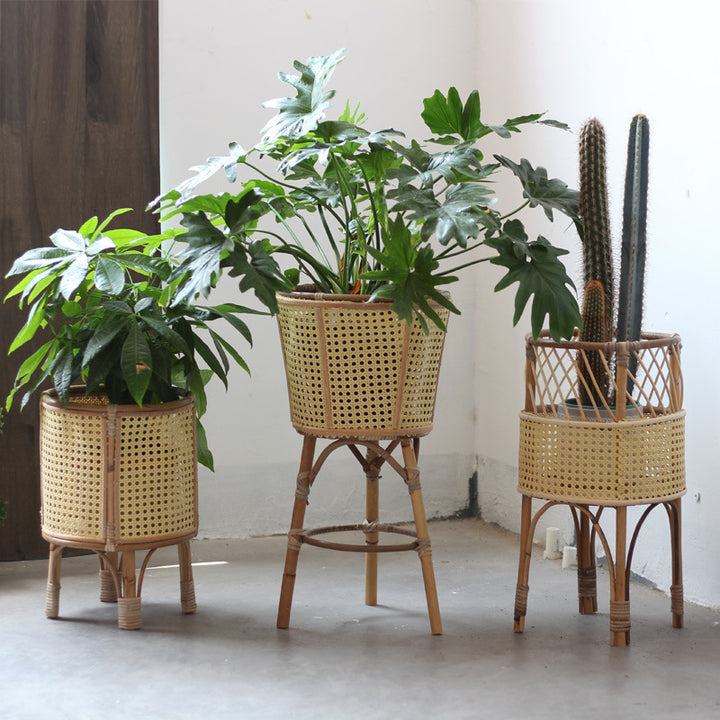 Stylish plant stand made of rattan Stornfield