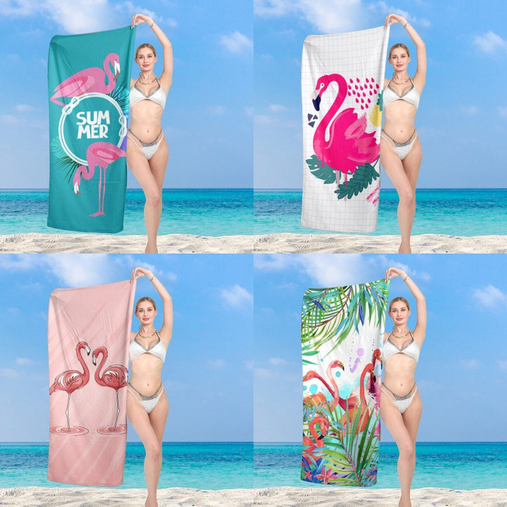 Premium beach towel with vibrant flamingo design Stornfield