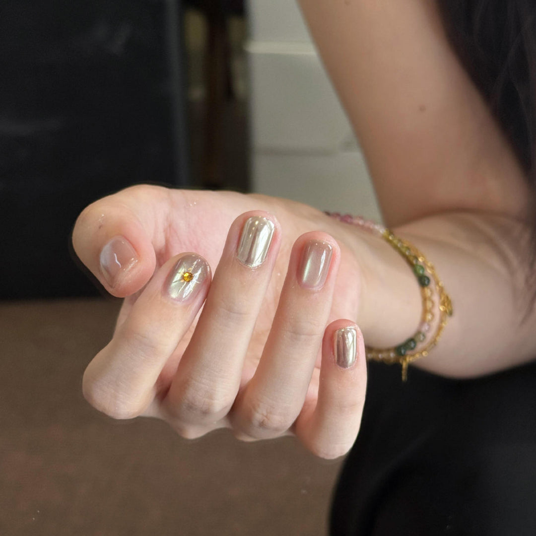 Artificial nails with luxurious metallic finish and sparkling accent Stornfield