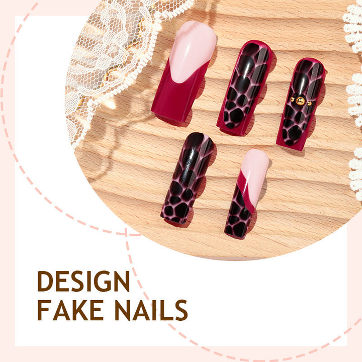 Nail set with stylish marbled designs and delicate accents Stornfield