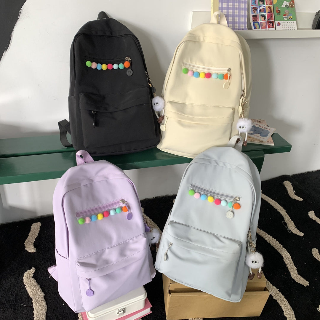 Practical backpack with colorful applications Stornfield