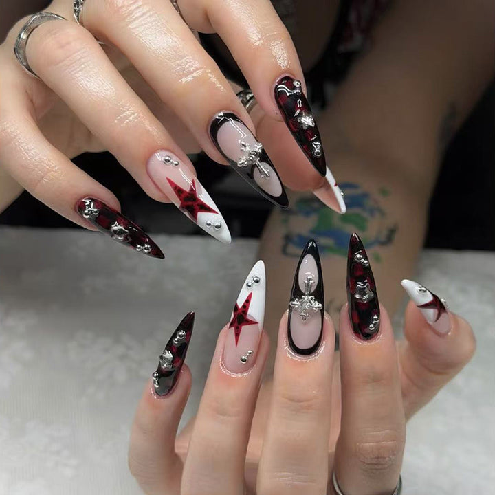 Artistic Stiletto Nail Extensions with Gem Accents Stornfield