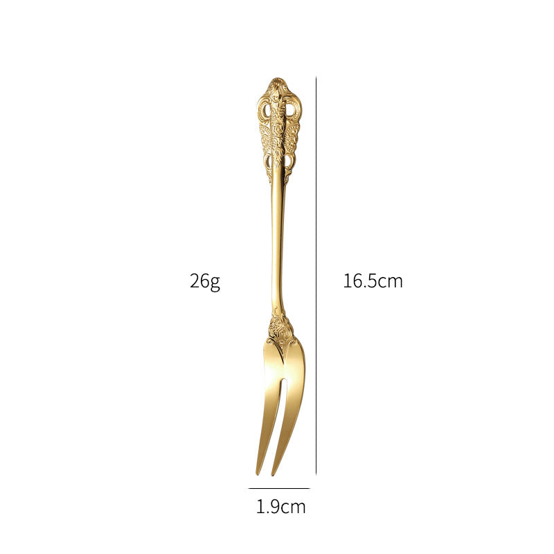 Elegant fish fork with artistic handle design Stornfield