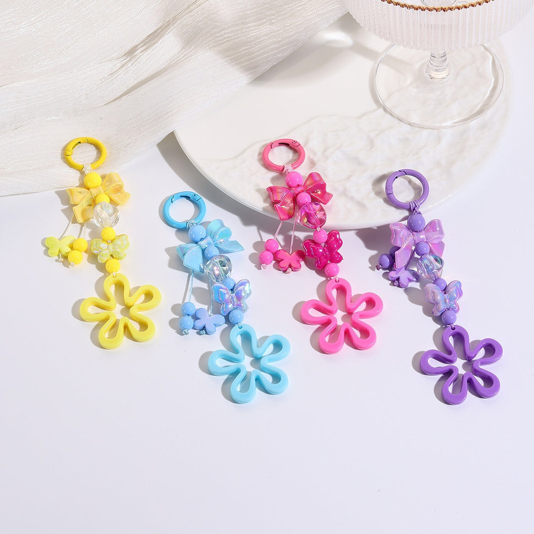 Playful keychain with flower and butterfly details Stornfield