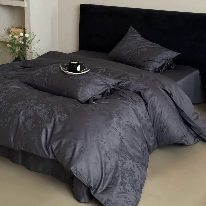 Luxurious jacquard bedding set with bow closures and floral relief