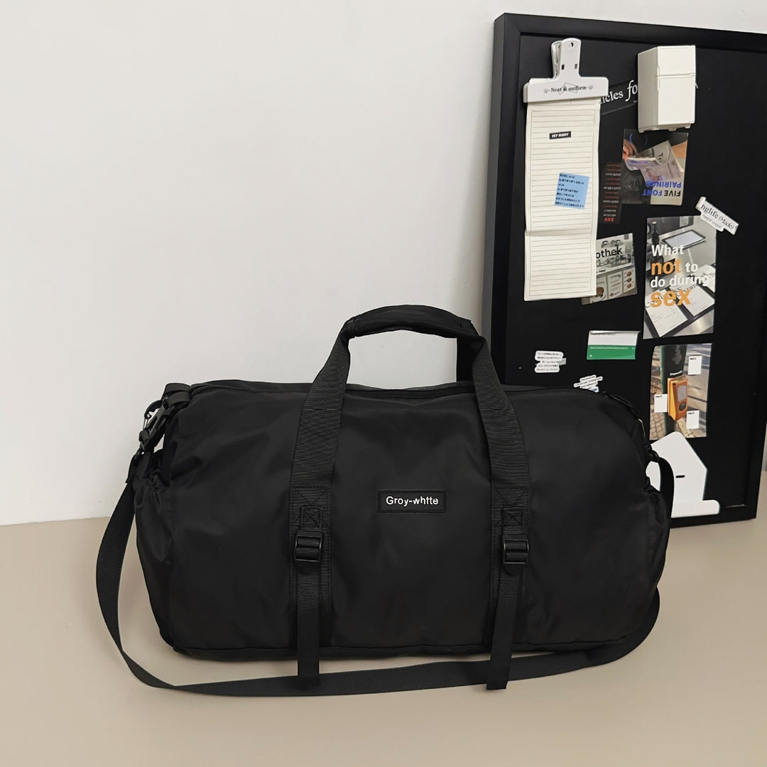 Sporty travel bag with adjustable shoulder strap and sturdy carrying handle Stornfield