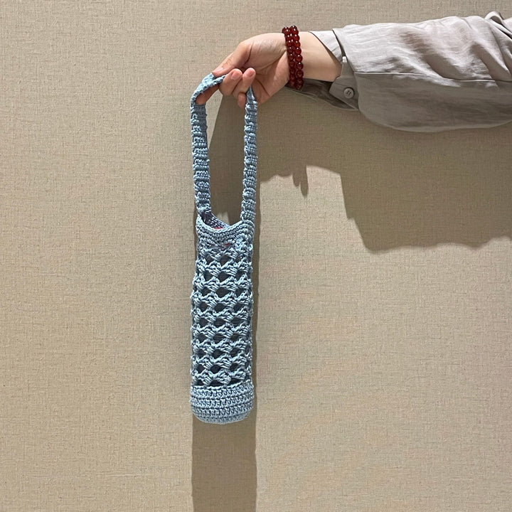 Hand-knotted bottle carrier Stornfield