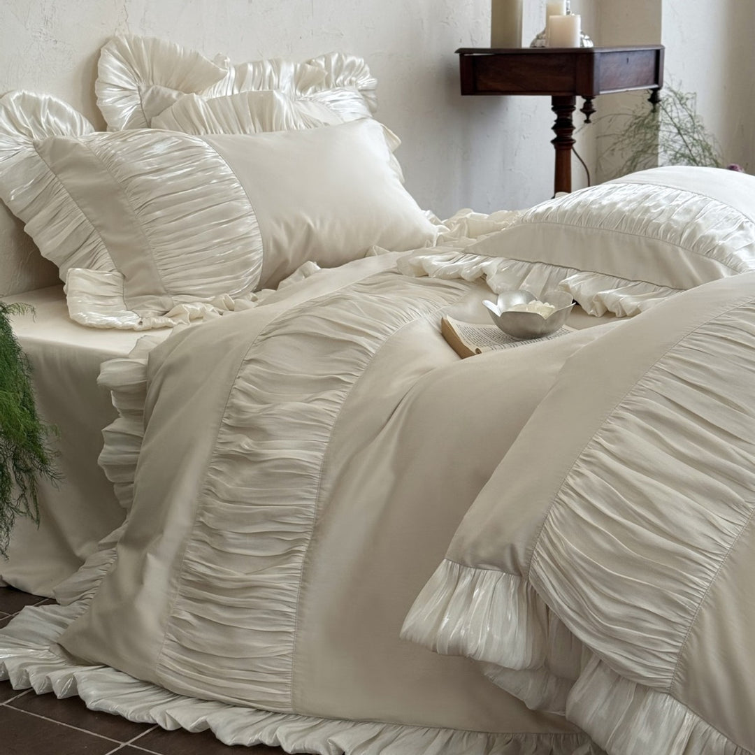 Romantic satin bedding set with ruffles and pleated inserts