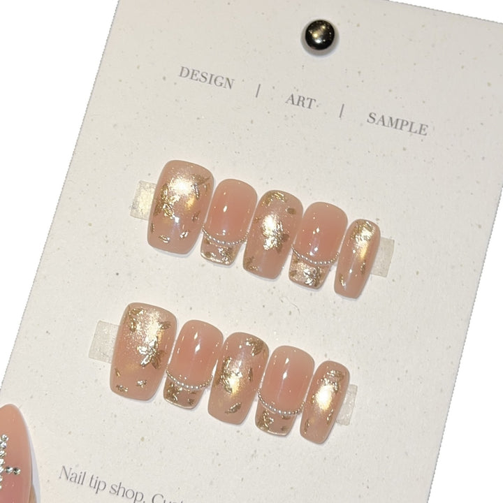 Artificial nails with elegant gold designs Stornfield